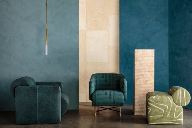 blue room with a curved sofa