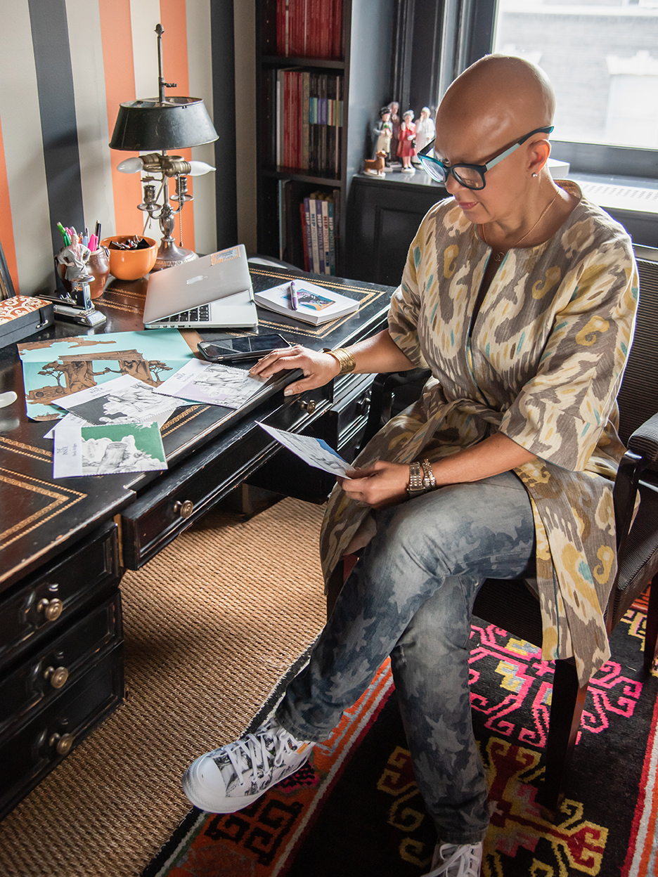 Sheila Bridges sitting at her desk