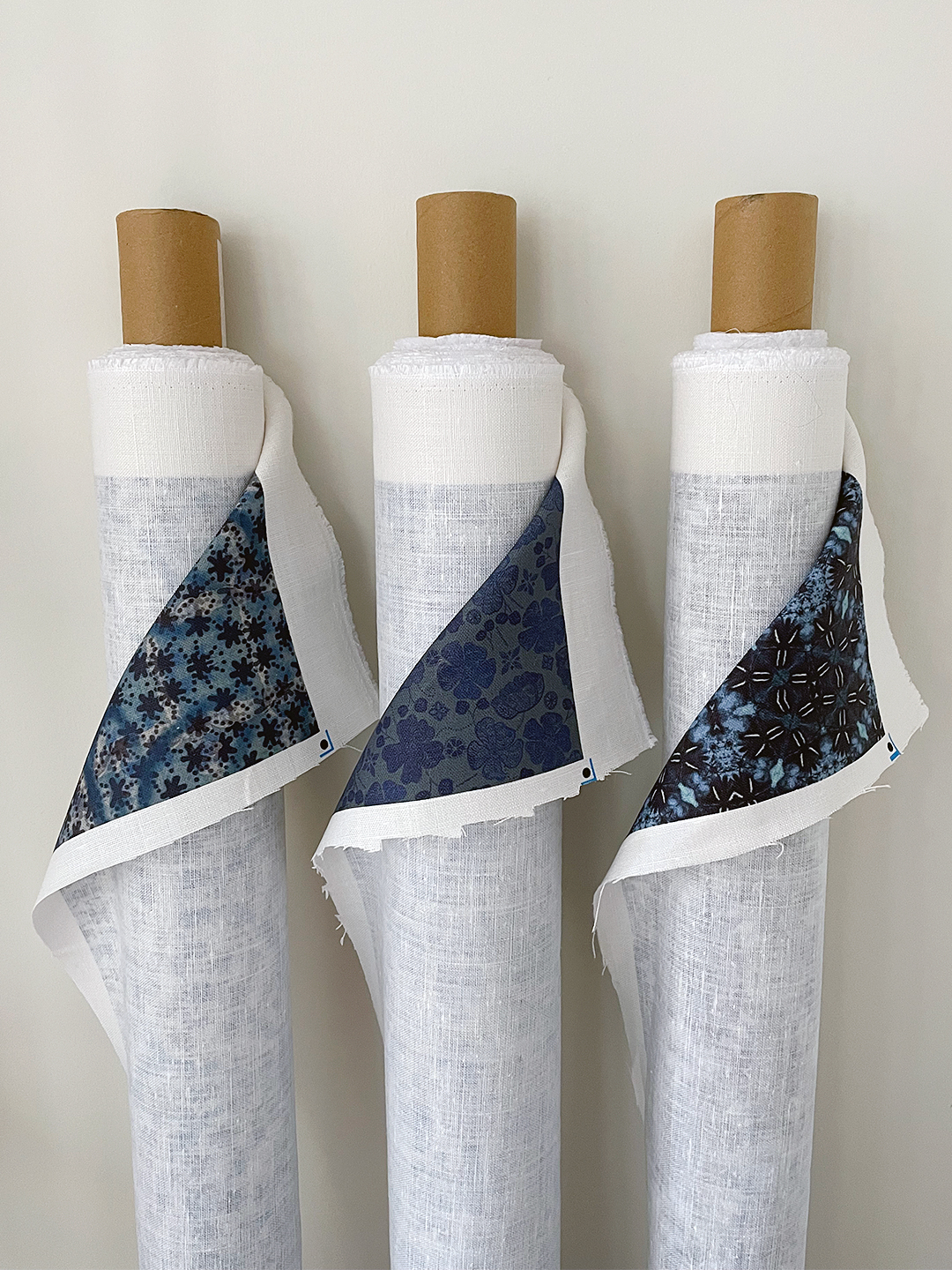 3 bolts of indigo patterned fabric