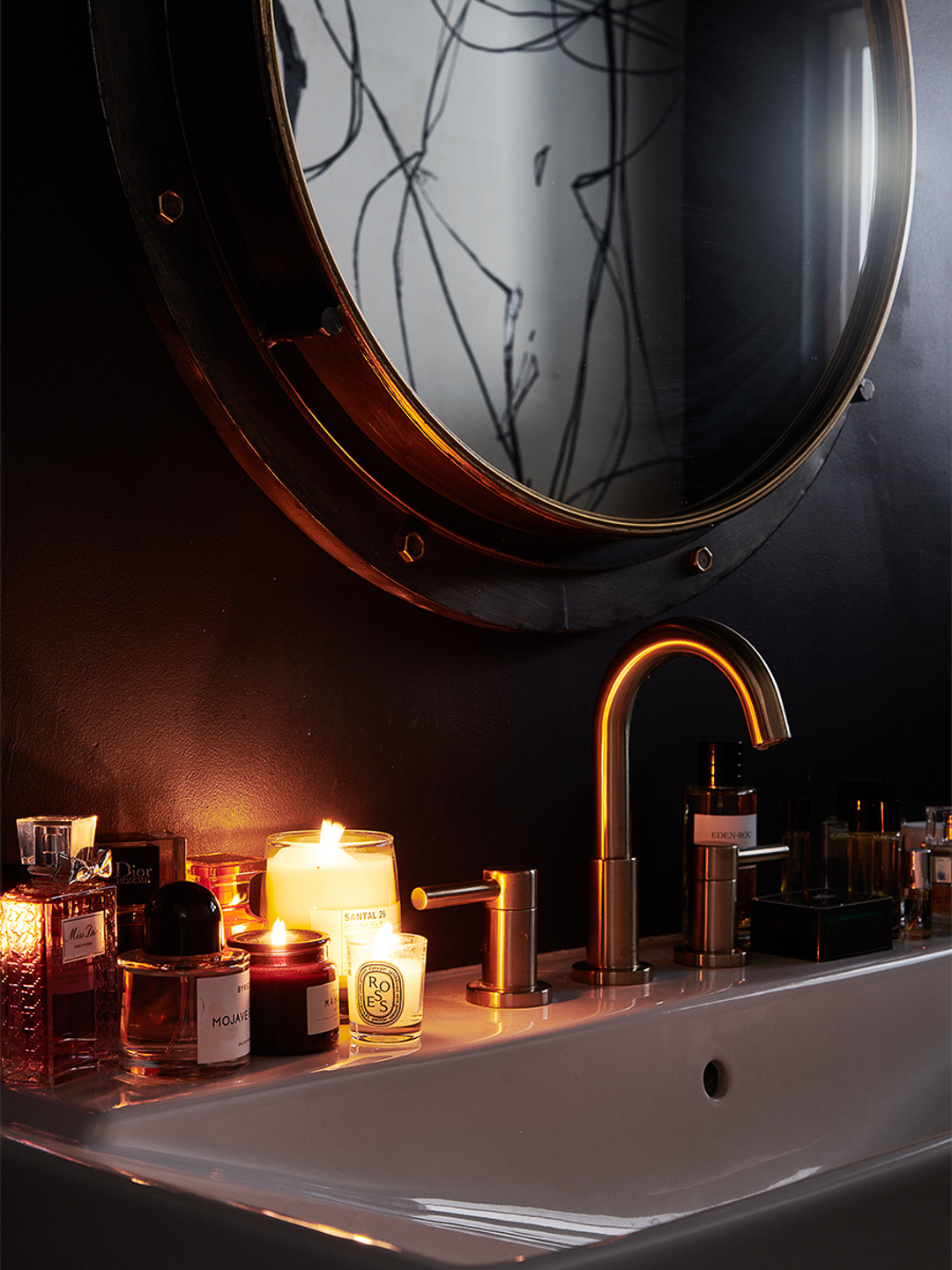 dark bathroom with candle