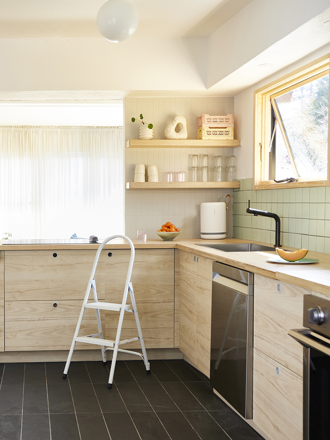 corner of a kitchen with wood cabinets
