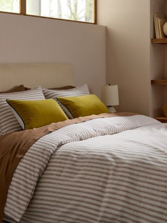 brown and yellow bedding